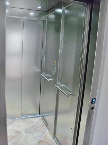 a shower with a glass door in a bathroom at La Casa del Mare in Sperlonga