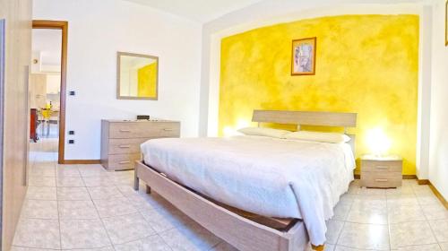 Katil atau katil-katil dalam bilik di Casa Rosalia cozy holiday apartment by Gardadomsumea