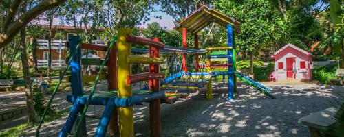 a playground with a colorful playground at Hotel São Sebastião da Praia in Florianópolis