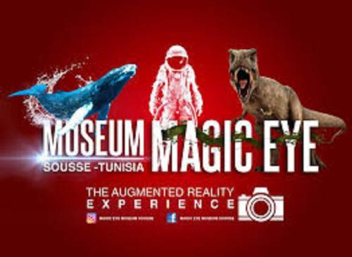 a poster for a movie with a picture of two animals at Apartment Essayadi Residence in Port El Kantaoui