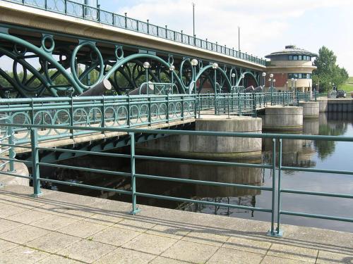 a bridge over a river next to a body of water at OutRam 26 in Stockton-on-Tees