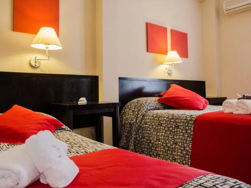 Katil atau katil-katil dalam bilik di Hotel Rex