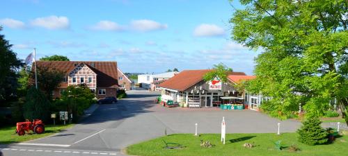 a view of a village with houses and a street at Fewo Obsthof Matthies in Jork