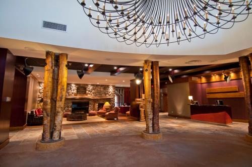 a large lobby with a large chandelier at Legends in Whistler