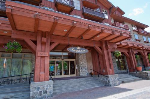 a building with awning on the front of it at Legends in Whistler