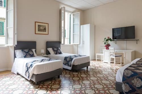 Voodi või voodid majutusasutuse Hotel St. James toas