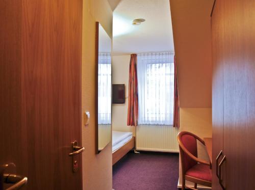 Un ou plusieurs lits dans un hébergement de l'établissement Hotel Park Eckersbach