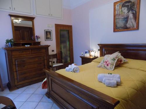 A bed or beds in a room at Casa Clotide