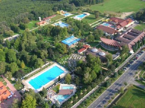 an aerial view of a resort with a swimming pool at Sweet Apartman Zalakaros in Zalakaros