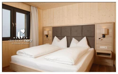 Cama o camas de una habitación en Das Tauernherz
