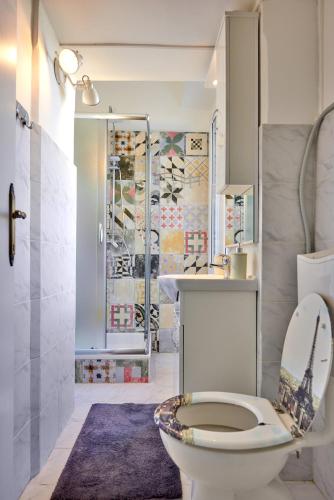 a bathroom with a toilet and a sink at Old City Romantic Studio with FREE private parking in Pula
