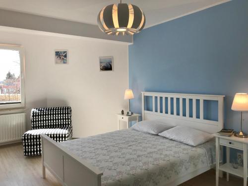 Tempat tidur dalam kamar di Apartament dwupokojowy Blue Sea