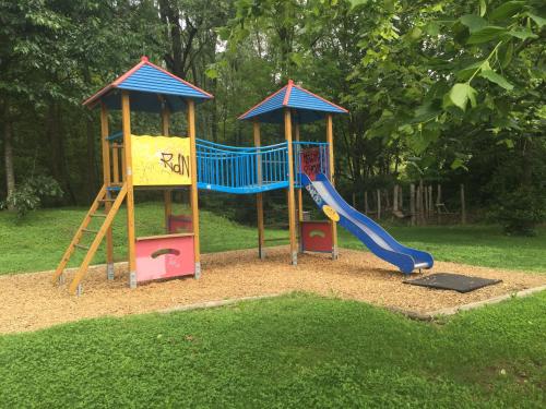 a playground with a slide at Casa Parentela in Ligornetto