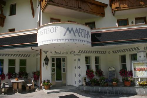 a building with a sign that reads mother marina at Gasthof Martha in Nauders