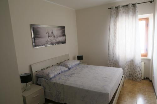 Cama o camas de una habitación en La Dimora sul colle