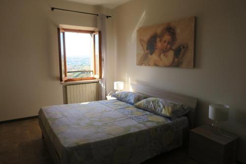 Cama o camas de una habitación en La Dimora sul colle