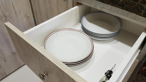 a mirror sitting on a shelf in a drawer at Oasis Condominium in Ipoh