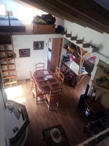 an overhead view of a room with a table and chairs at Casa de campo vacacional "Tres Soles" en Xico, Veracruz in Xico