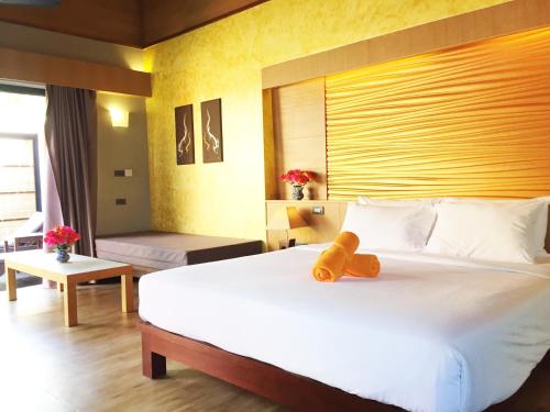Postel nebo postele na pokoji v ubytování Weekender Resort