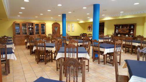 Reštaurácia alebo iné gastronomické zariadenie v ubytovaní Hotel Cortijo