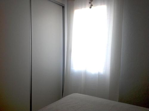 Ένα ή περισσότερα κρεβάτια σε δωμάτιο στο Chalet Tango