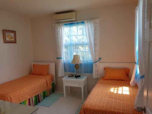 Postel nebo postele na pokoji v ubytování MIRI-JOY APARTMENTS