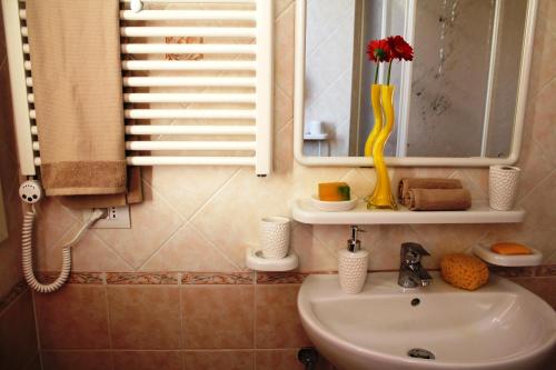Koupelna v ubytování Airone Bianco Residence Village
