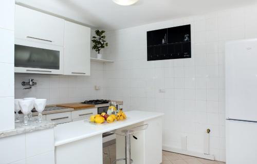 Kuchyň nebo kuchyňský kout v ubytování Capri Town Apartments