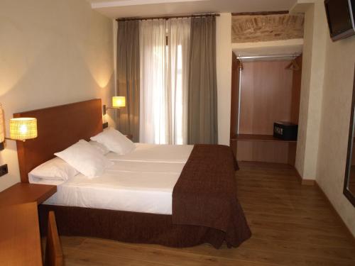 Letto o letti in una camera di Hotel Las Leyendas