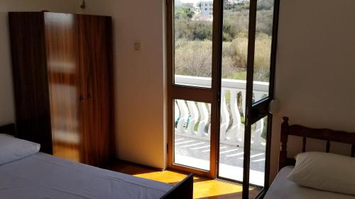 Postel nebo postele na pokoji v ubytování Guesthouse Kodre