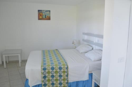 Costarena Beach Hotelにあるベッド