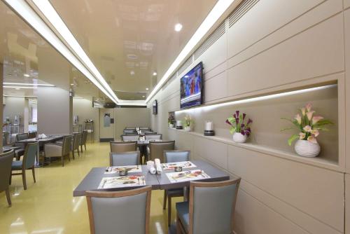 A restaurant or other place to eat at Ramada by Wyndham Downtown Beirut