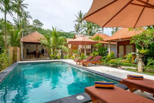 an image of a villa with a swimming pool at Crystal Bay Bungalows in Nusa Penida