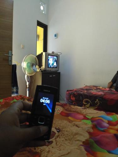Kost Backpackerにあるテレビまたはエンターテインメントセンター