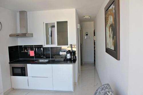 Η κουζίνα ή μικρή κουζίνα στο Apartamento Horizonte