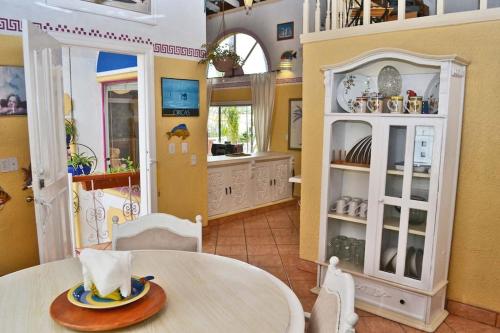 a room with a table with a hat on it at Amazingly Romantic Vacation for Your Honeymoon in Tijuana