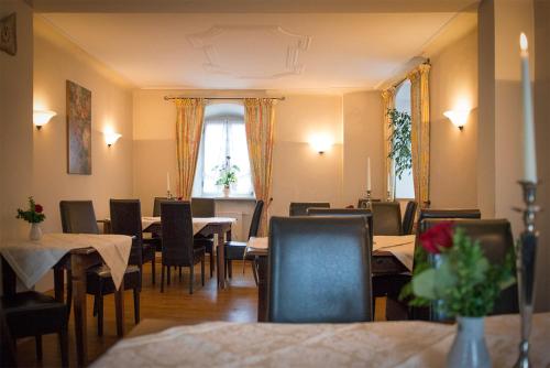 Restavracija oz. druge možnosti za prehrano v nastanitvi Der Patrizierhof - Weingut Gasthof Hotel - Familie Grebner