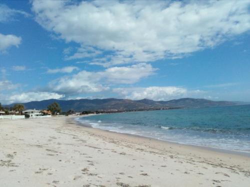 a view of the beach from the shoreline at Casa Stella Di Madel in Flumini di Quartu