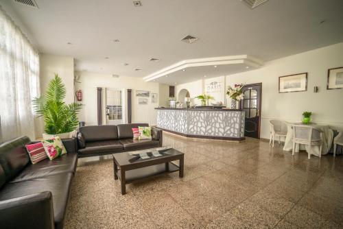 Posezení v ubytování Hotel Oasis Familiar
