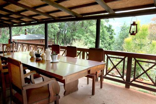 Balkón nebo terasa v ubytování Zongororo Mountain Lodge