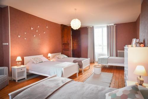 Cama ou camas em um quarto em Domaine de La Ramée