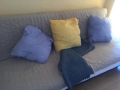 Een bed of bedden in een kamer bij Ático confortable