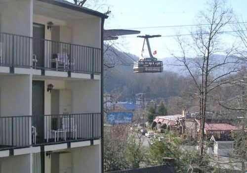 a apartment building with a view of a ski lift at DreamCatcher Downtown Gatlinburg in Gatlinburg