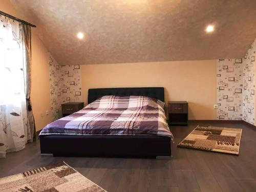 En eller flere senge i et værelse på Vila Maria