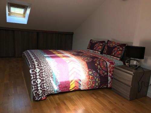 En eller flere senge i et værelse på Appartement Rue Victor Hugo - Port de la Houle