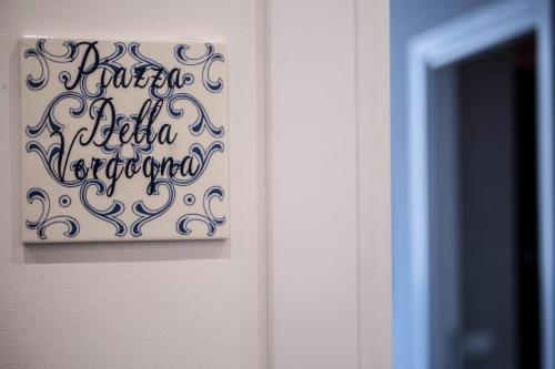 a sign on a door that reads princess hello margaret at Family Affair Luxury Rooms&Suites in Palermo