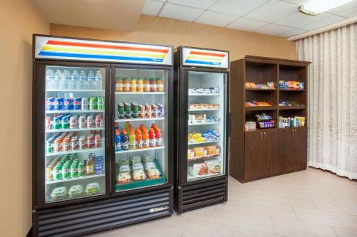a large refrigerator filled with lots of drinks at Wyndham Garden Schaumburg Chicago Northwest in Schaumburg