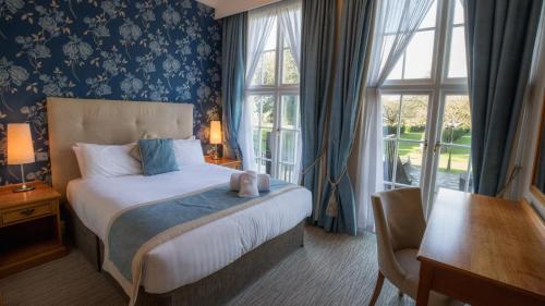 Кровать или кровати в номере Hazlewood Castle & Spa