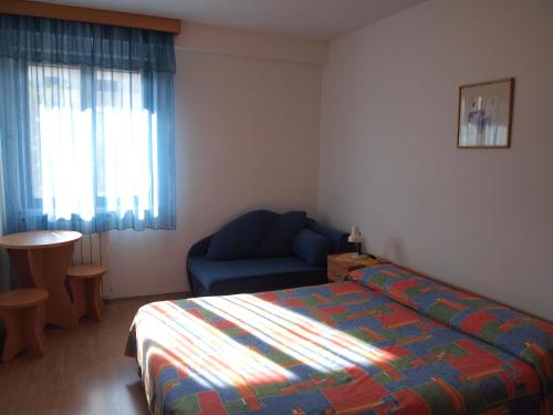 Posteľ alebo postele v izbe v ubytovaní Apartments Marko Novigrad