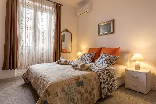 Posteľ alebo postele v izbe v ubytovaní Apartment KAPO